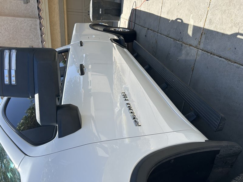 Detailed white pickup truck, side exterior view with running boards