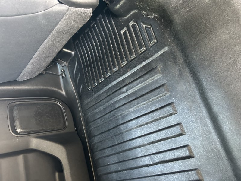 Clean pickup truck rear floor mat interior